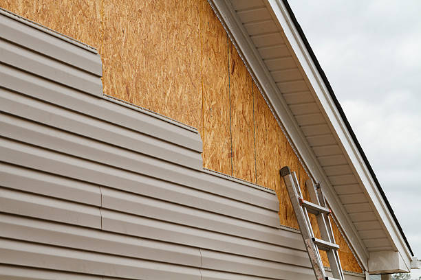 Professional Siding technician working in Newton Lower Falls, MA